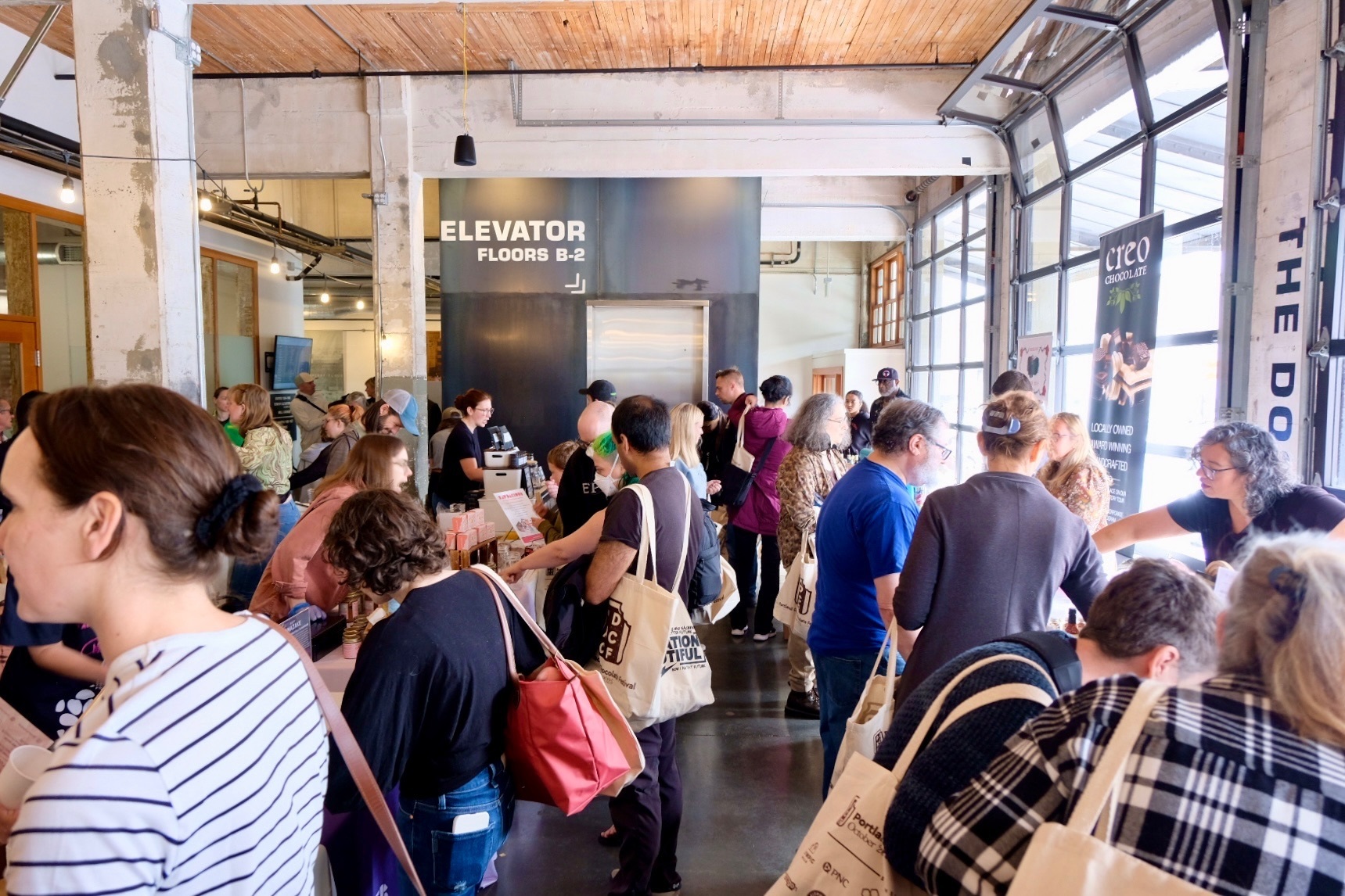 Guests exploring the festival at Olympic Mills